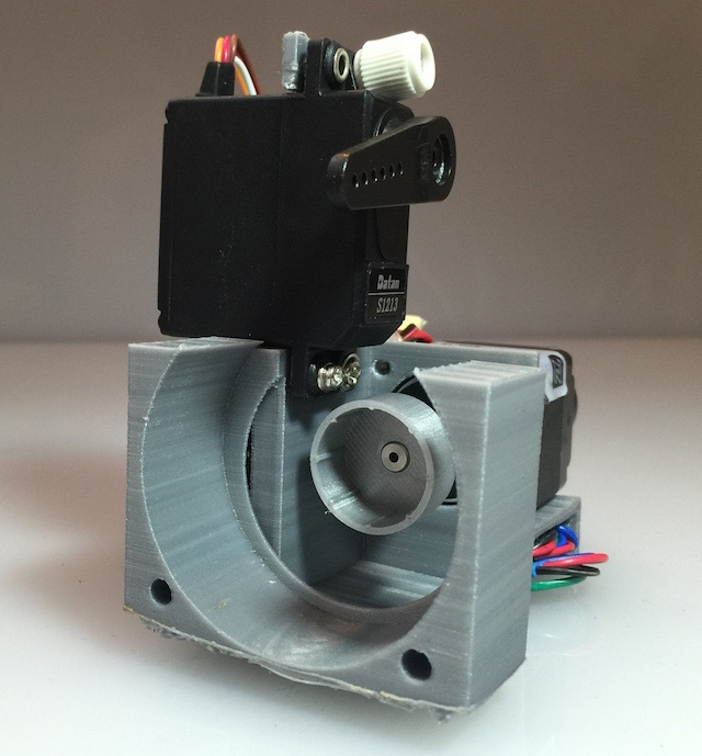 Samy Kamkar's Combo Breaker: grey 3D-printed housing with stepper motor and servo
