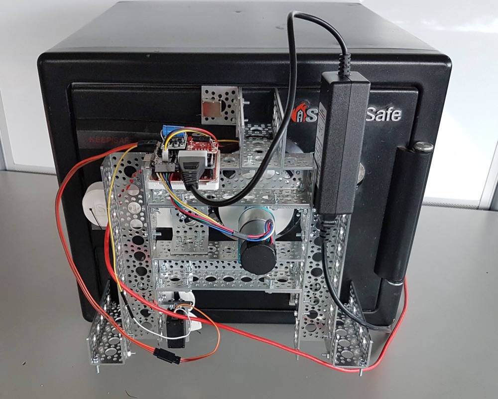 SparkFun Safe Cracker robot built from aluminium channel, mounted on the front of a SentrySafe
