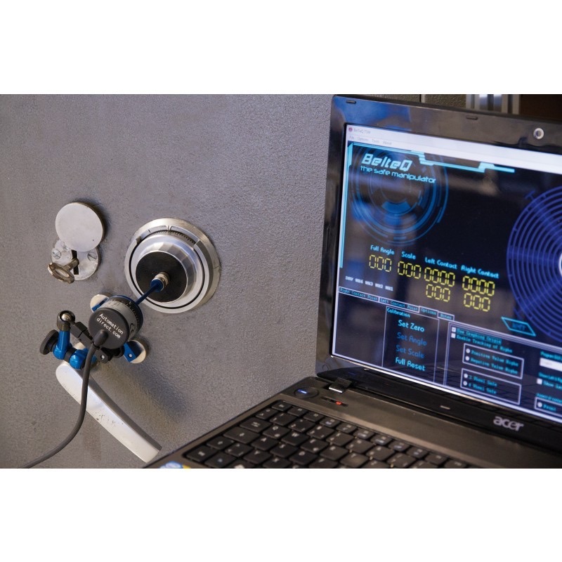 TSM encoder clamped to a safe dial, connected to a laptop running the TSM graphing software